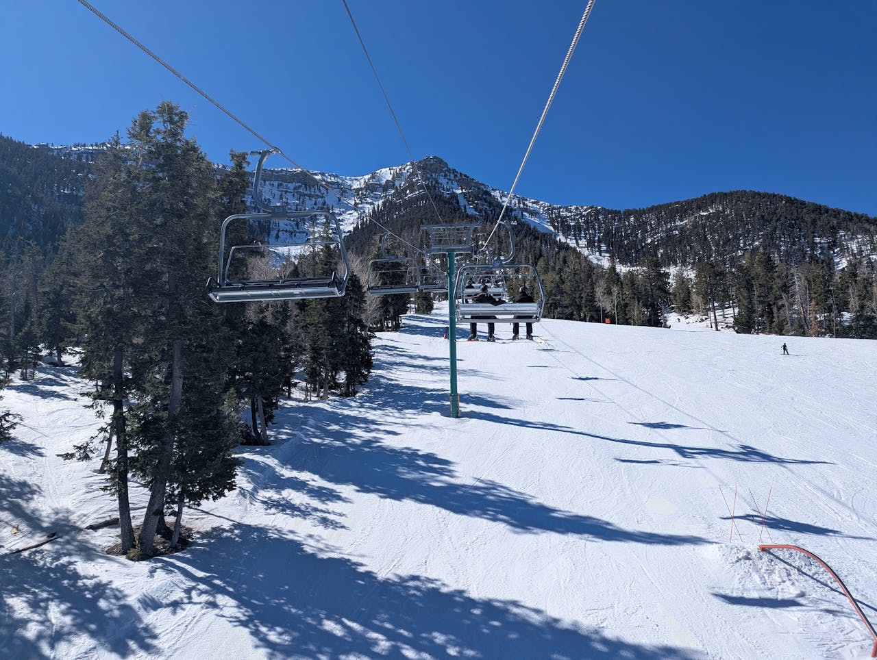 Scenic view of a ski lift and snowy slopes at Mount Charleston, Nevada.